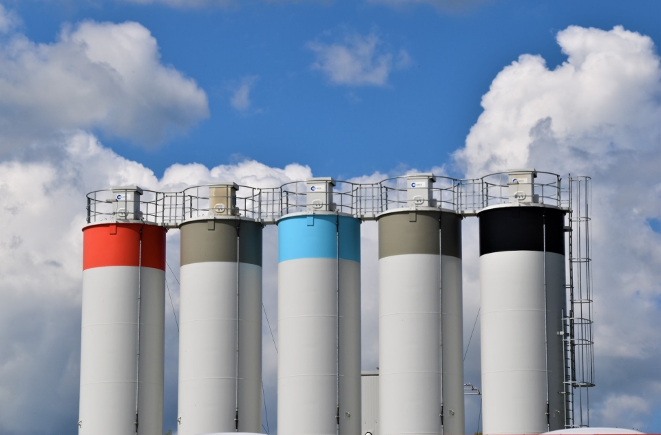 Different chimney silos in pastel colours